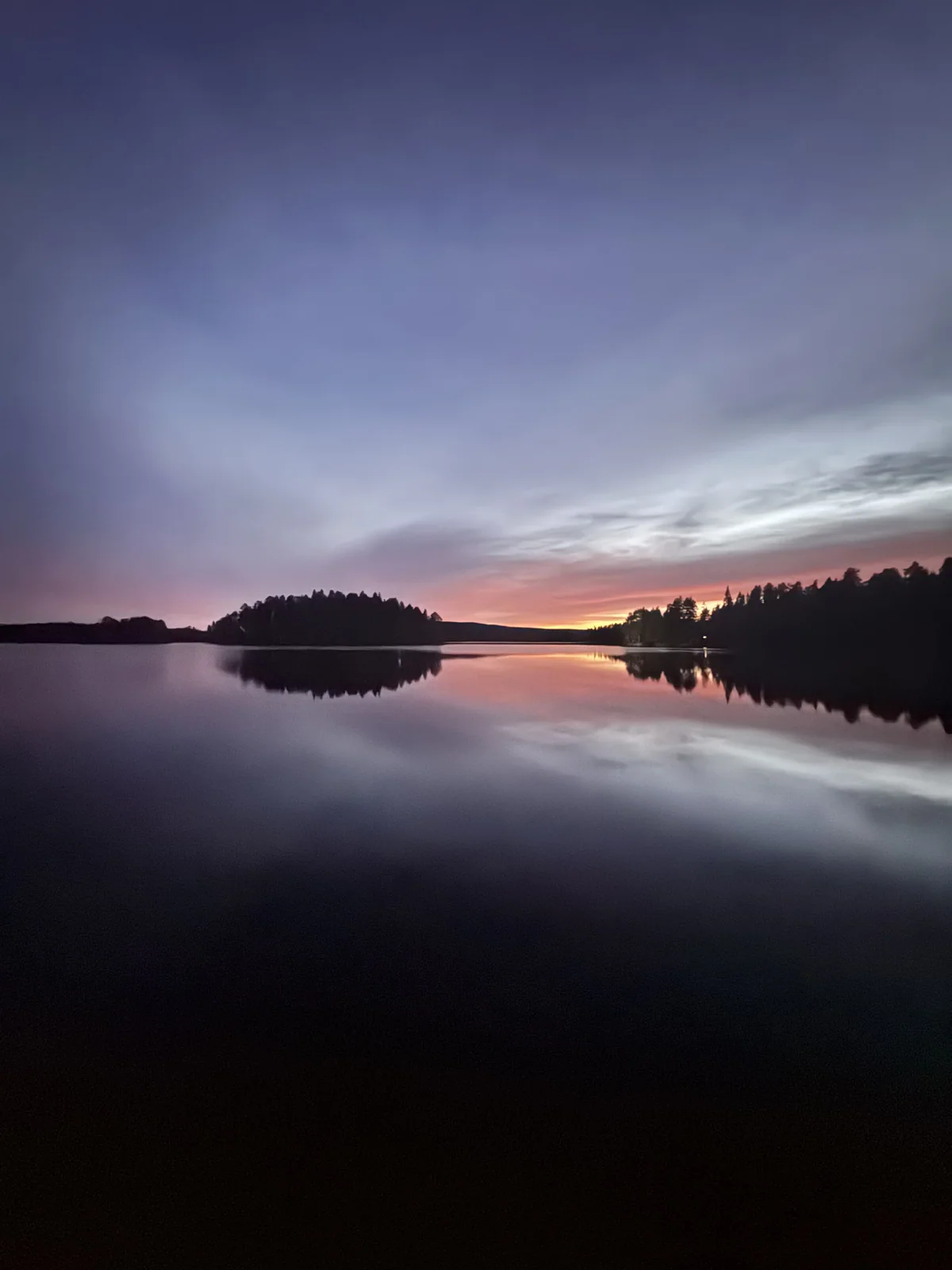 Evening light reflected across the lake in Närsen